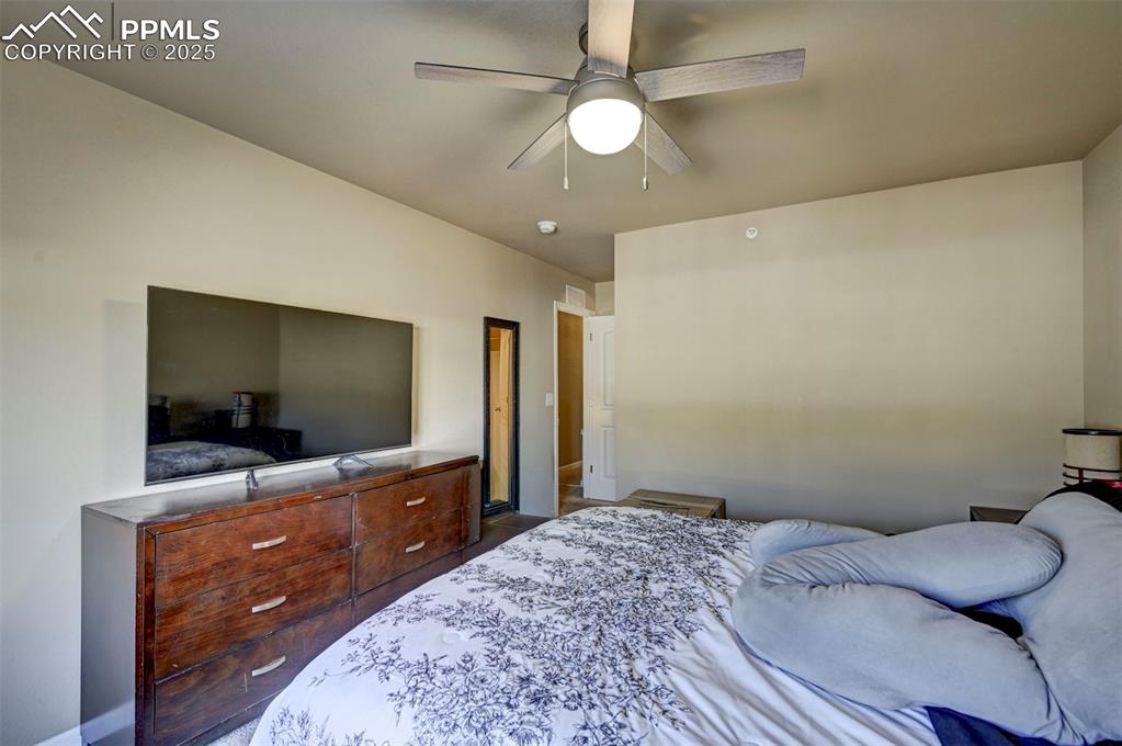 Image 16 of 29: Bedroom featuring ceiling fan and baseboards