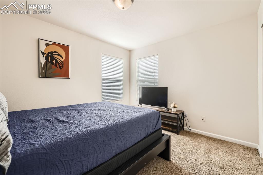 Image 19 of 39: Bedroom featuring carpet flooring and baseboards