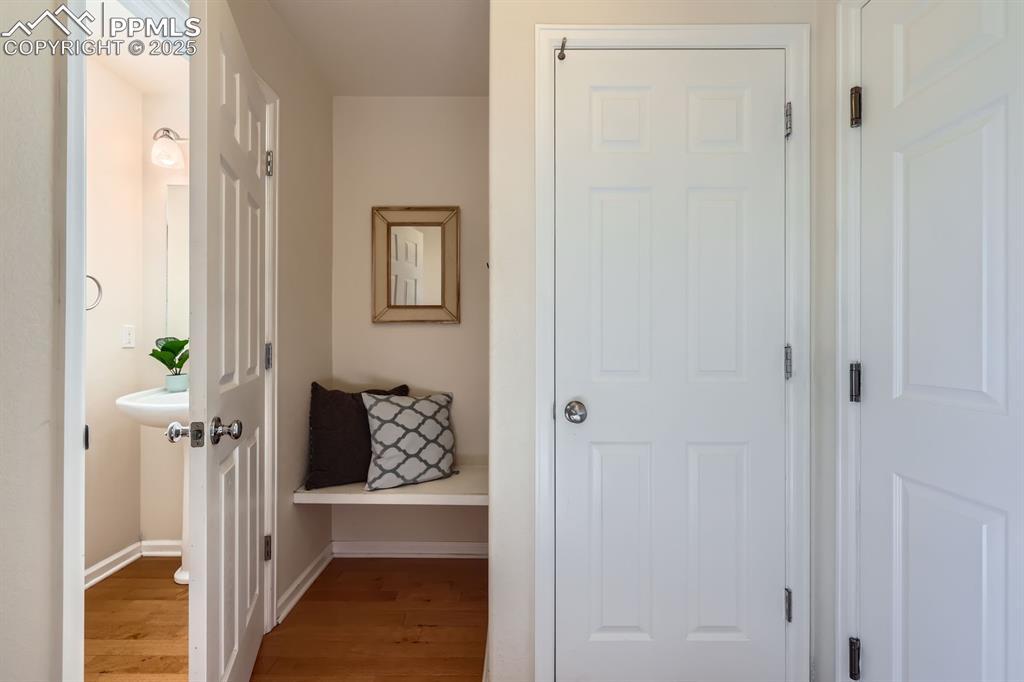 Image 35 of 39: Hall featuring light wood-style floors and baseboards