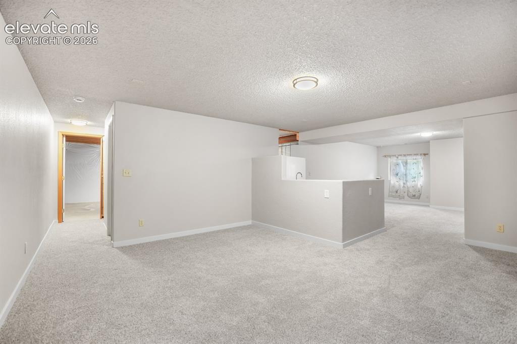 Image 29 of 42: Basement living room