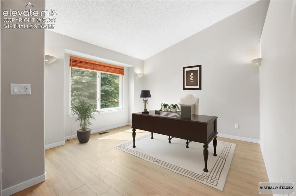 Image 3 of 42: Formal Dining room virtually staged