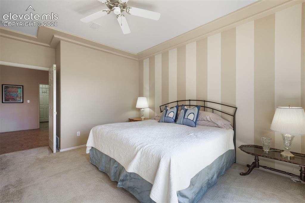 Image 19 of 50: Tray ceiling with decorative molding, providing architectural detail