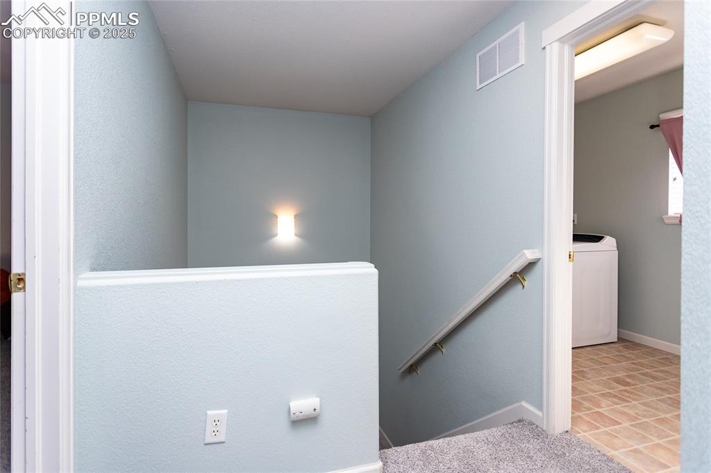 Image 18 of 35: stair view from upper landing