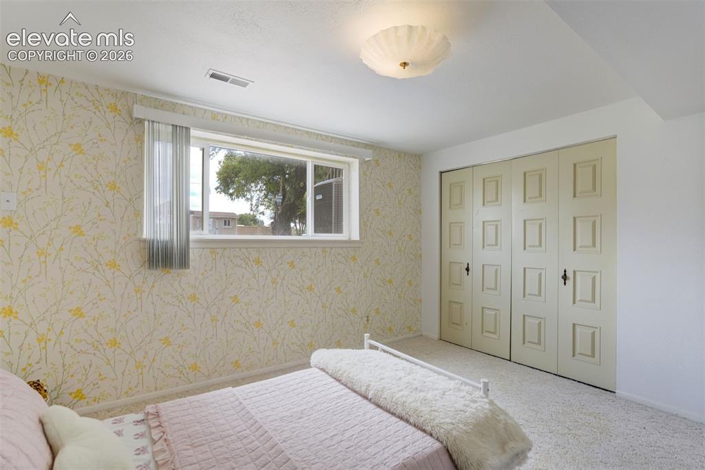 Image 16 of 33: Bedroom