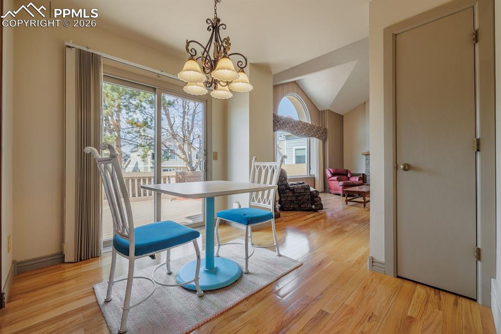 Image 11 of 40: From nook onto the family room with large picture window