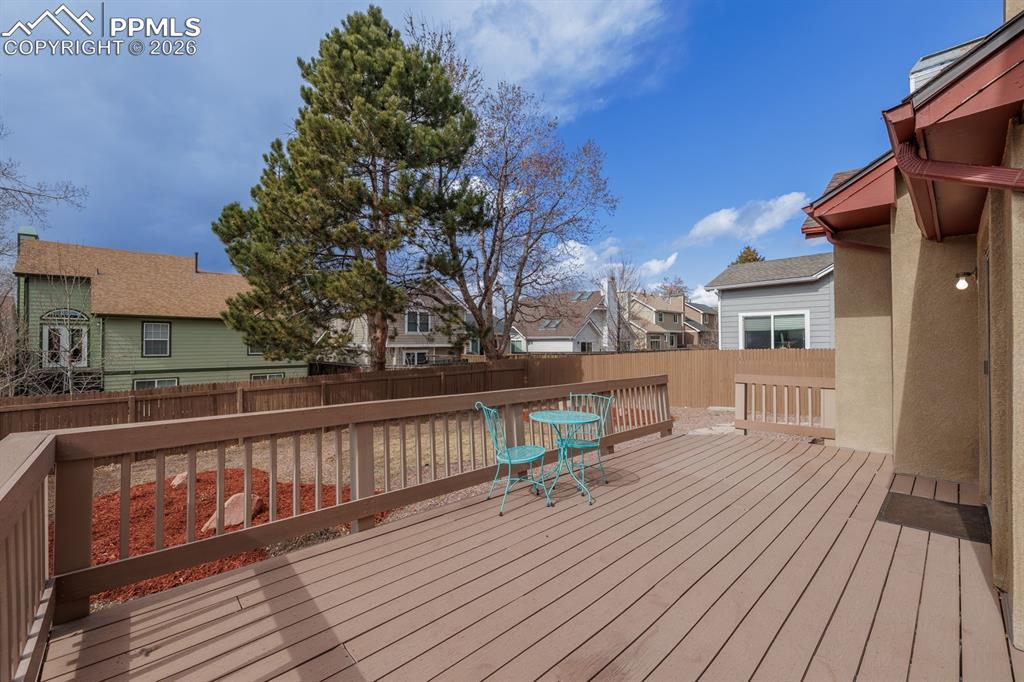 Image 12 of 40: Deck off of kitchen nook perfect for BBQ