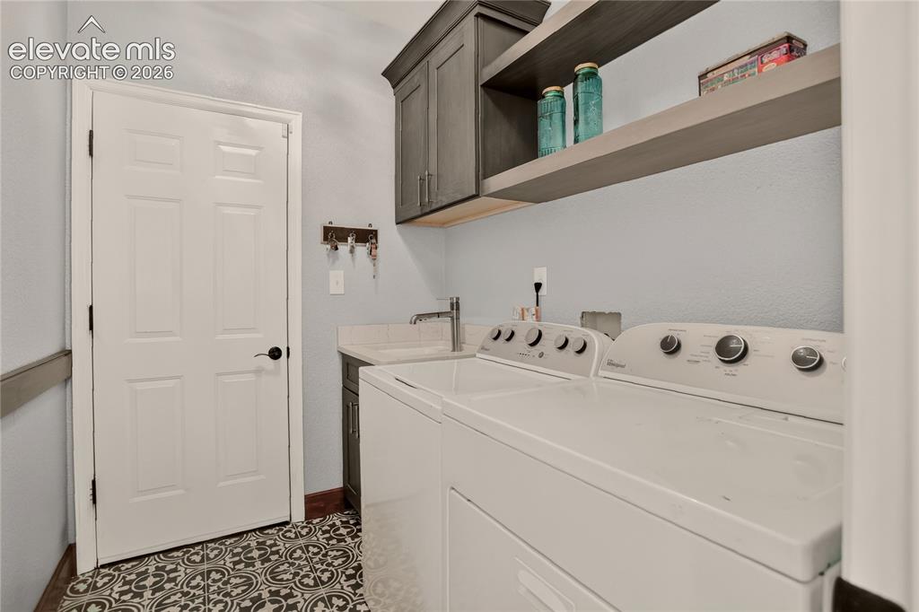 Image 29 of 46: Main level full hall bath.