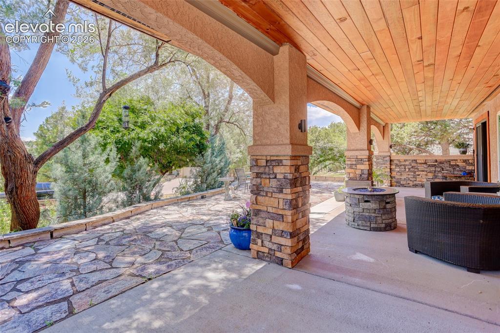 Image 32 of 46: Covered patio.