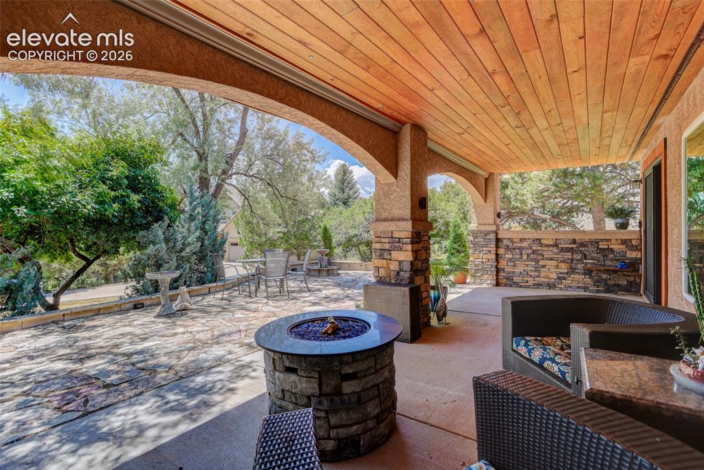 Image 33 of 46: Covered patio.