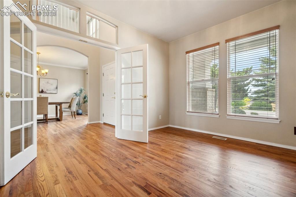 Image 27 of 49: Office with French Doors