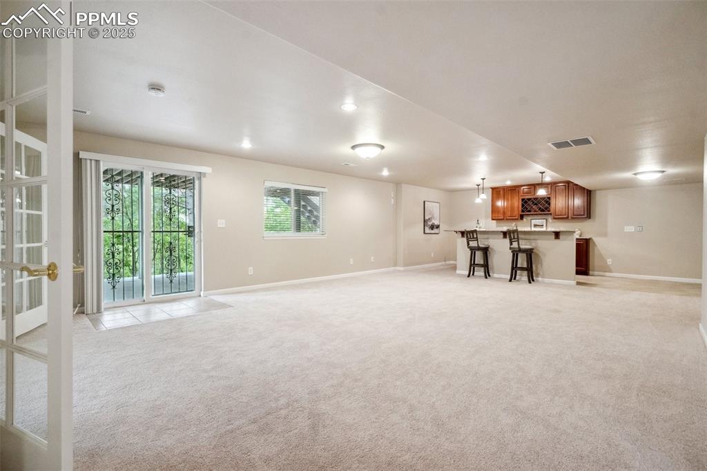Image 43 of 49: REC Room & Wet Bar