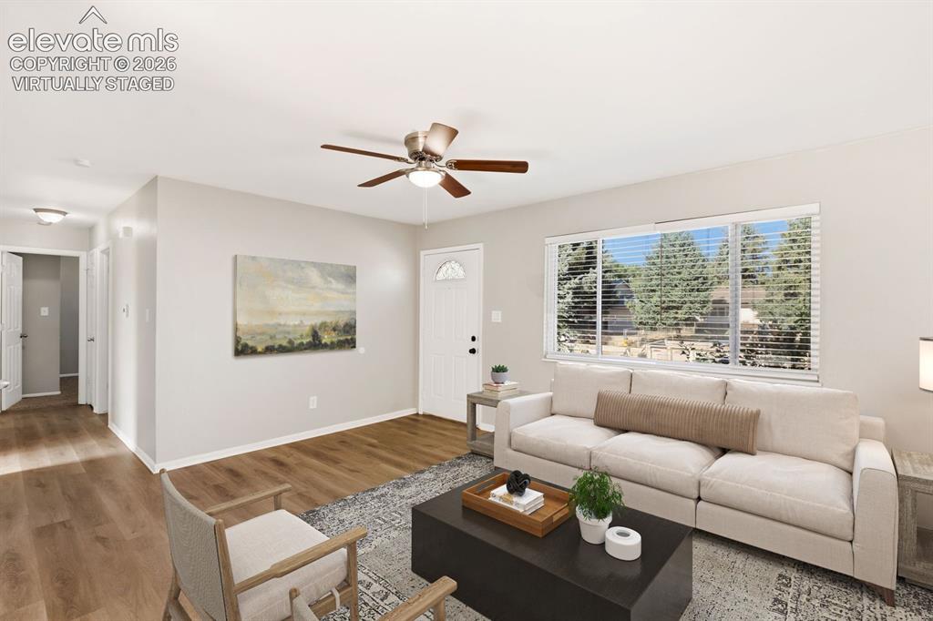 Image 4 of 35: Front Door and Family Room area