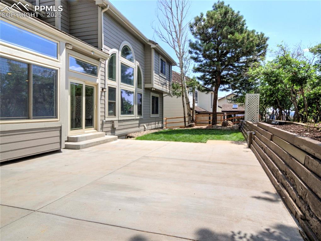 Image 47 of 50: View of patio with entry steps