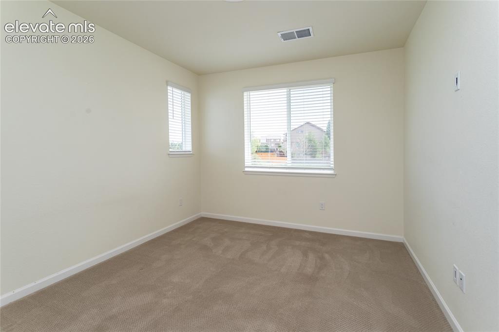 Image 18 of 28: Bedroom