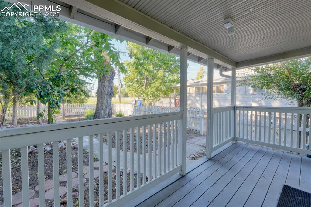 Image 27 of 28: View of wooden porch