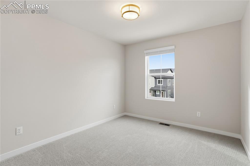 Image 19 of 33: Bedroom