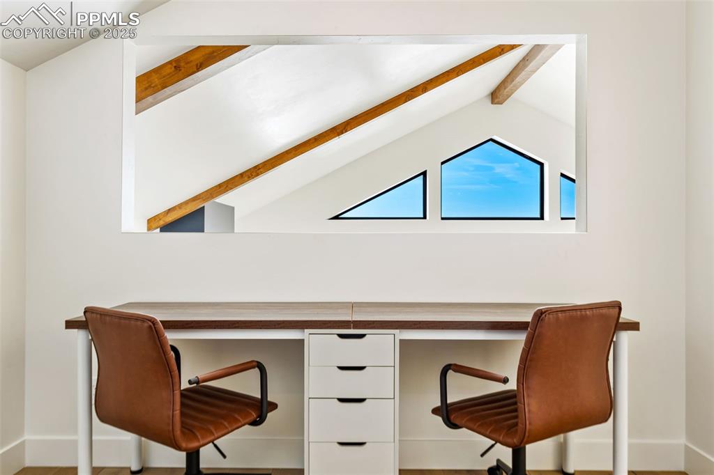 Image 36 of 49: Office with baseboards and wood finished floors