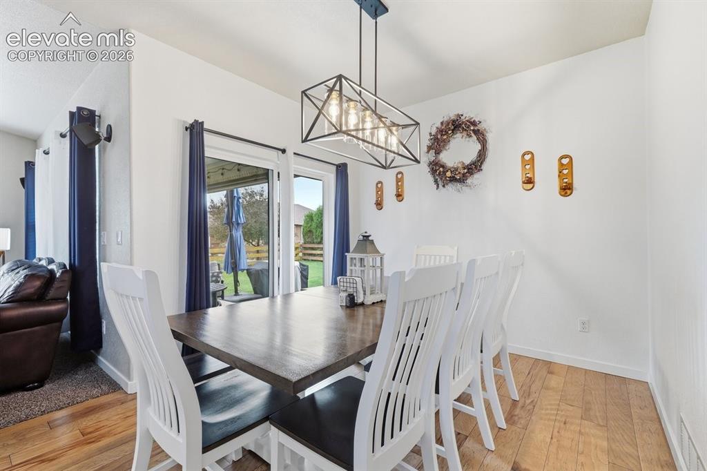 Image 12 of 50: dining area leads to the covered patio