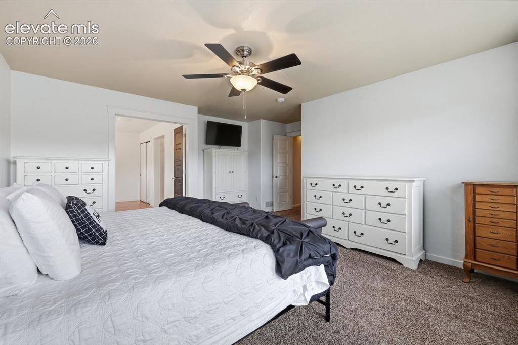 Image 17 of 50: French doors leading into the bedroom