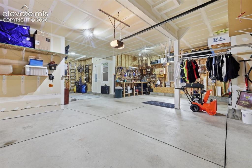 Image 44 of 50: 4 car tandem garage, a rare find