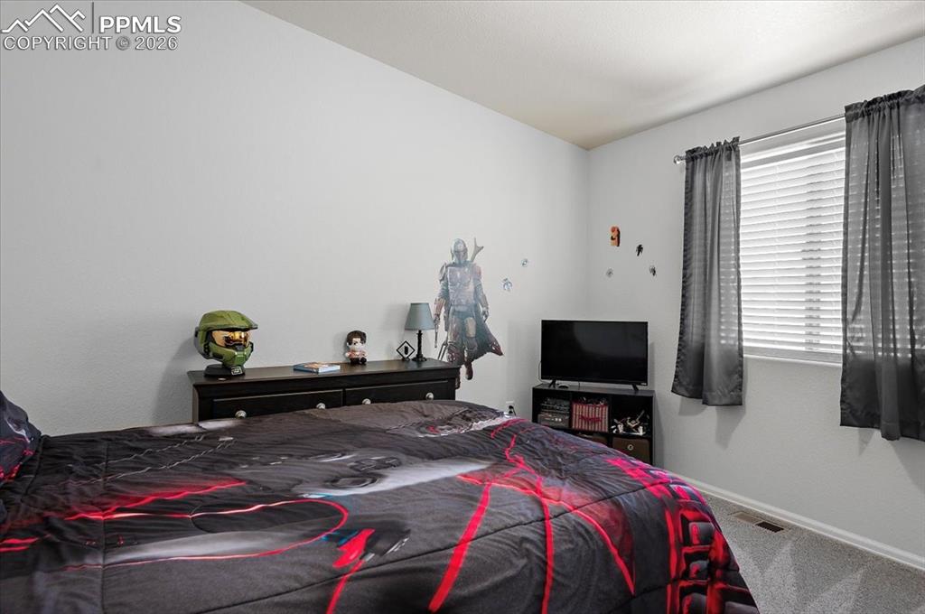 Image 13 of 36: Bedroom