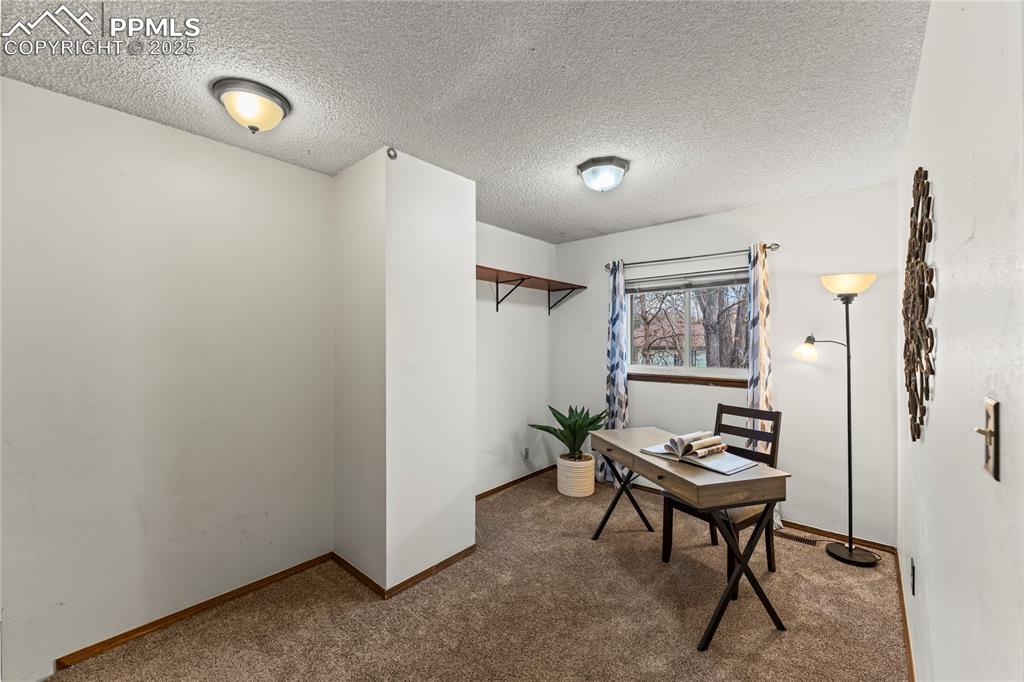 Image 11 of 21: Loft area on upper level