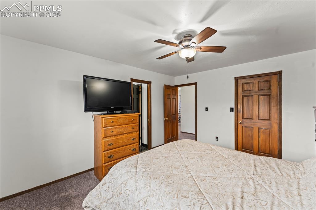 Image 17 of 21: Primary bedroom with attached bath.
