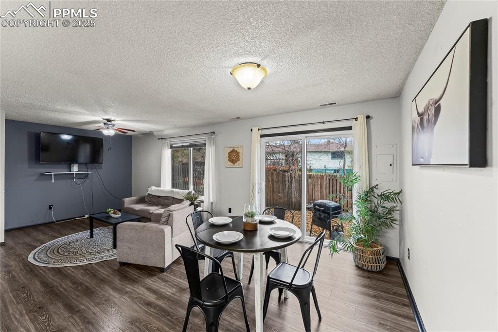 Image 4 of 21: Dining area off kitchen with walkout to back patio