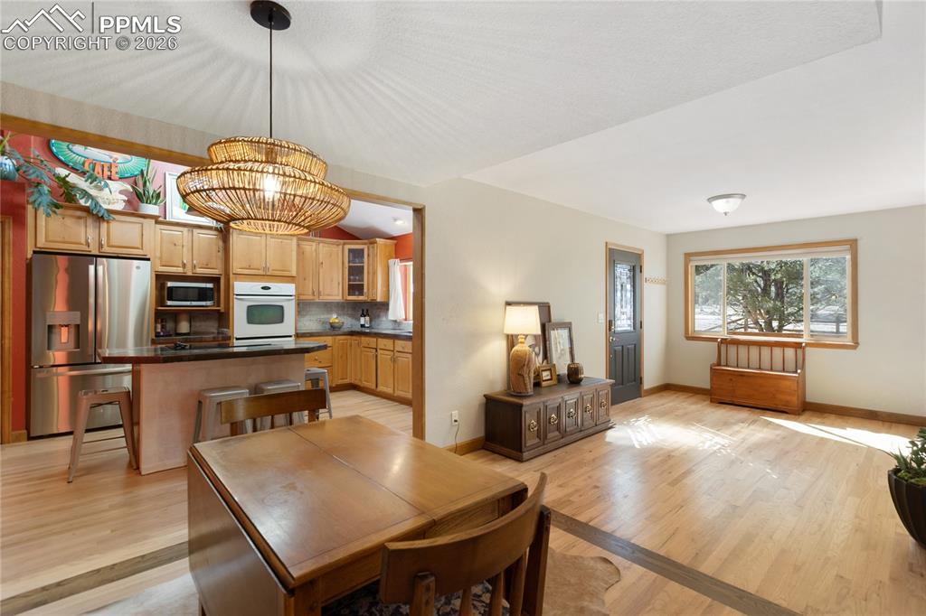 Image 11 of 50: Spacious dining area off the large kitchen