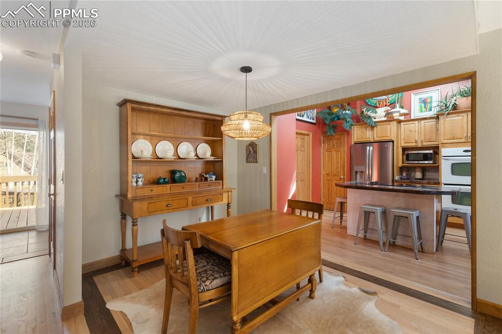 Image 12 of 50: Spacious dining area off the large kitchen