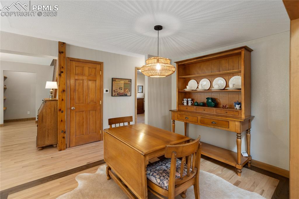 Image 14 of 50: Dining area looking toward bedroom / office
