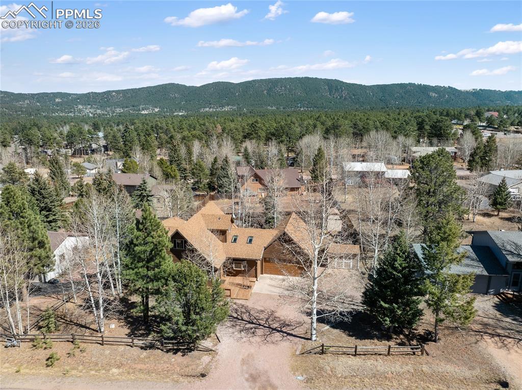 Image 22 of 50: Located in one of the best family friendly neighborhoods in Woodland Park,