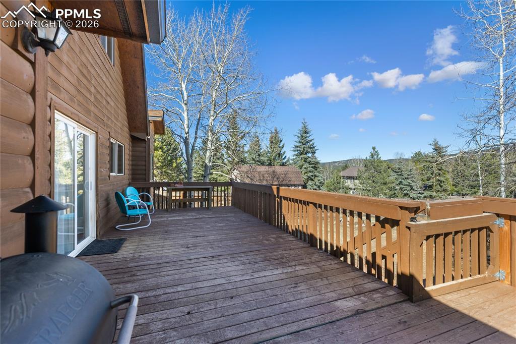 Image 49 of 50: Fire up the grill kick back on this huge deck while watching the dogs and k