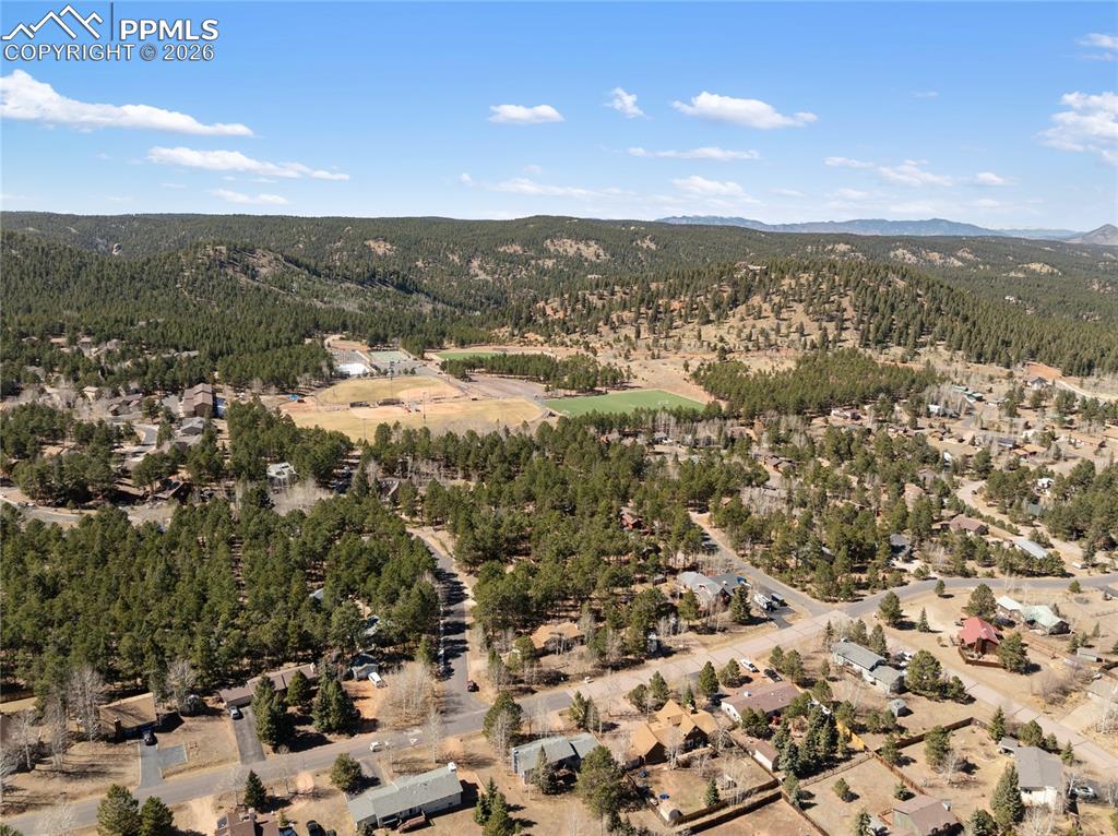 Image 50 of 50: House pictured bottom slightly right. Close enough to meadow wood to walk b