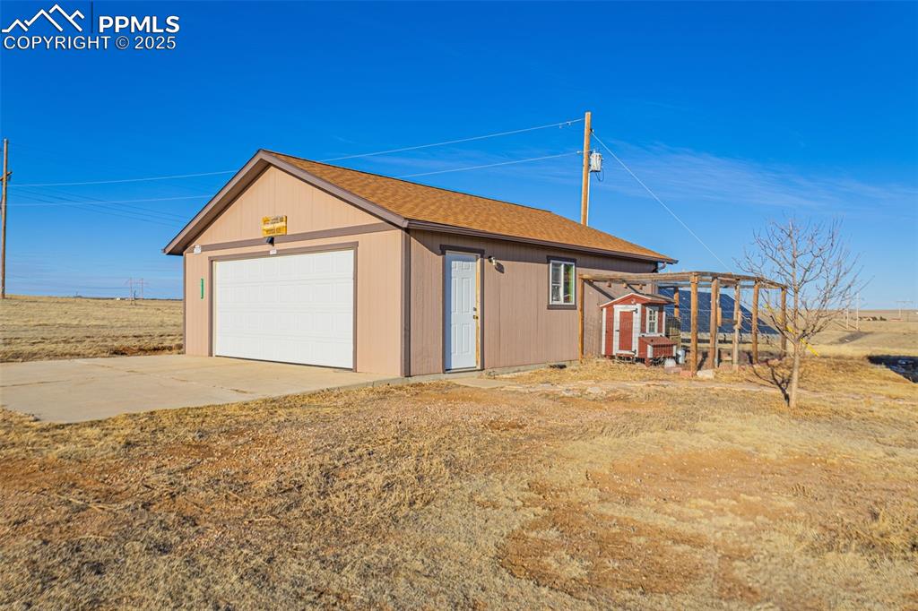 Image 33 of 48: DETACHED HUGE GARAGE 
