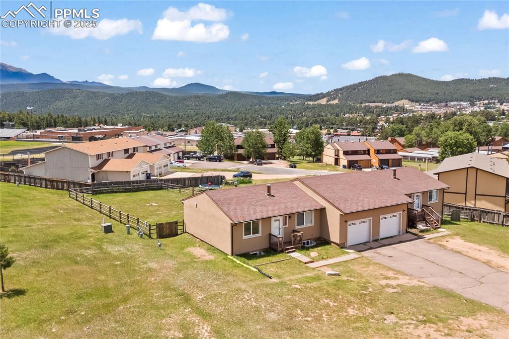 Image 2 of 34: View of mountain backdrop featuring nearby suburban area