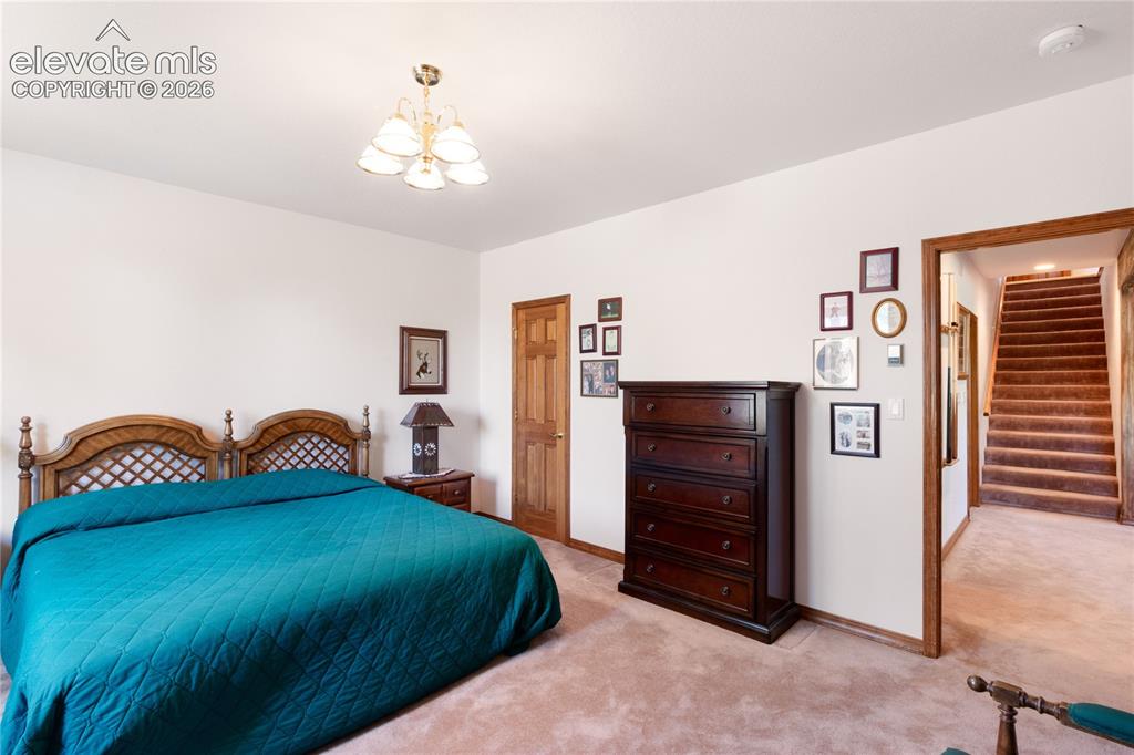 Image 29 of 48: Basement Bedroom