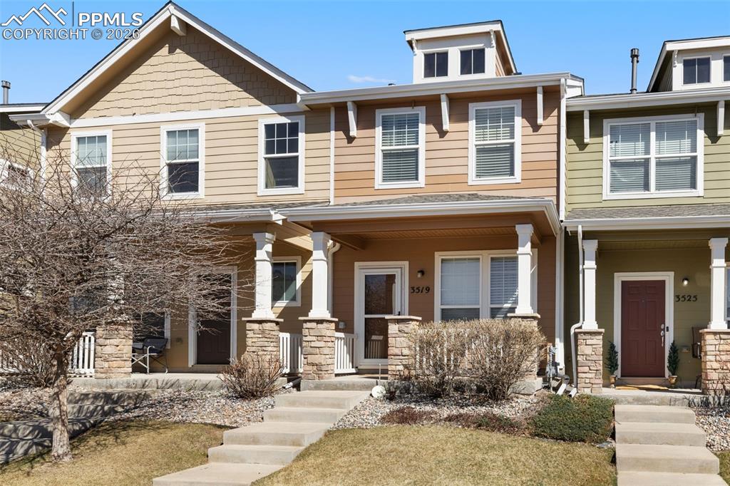 Image 2 of 26: Craftsman-style home with covered porch