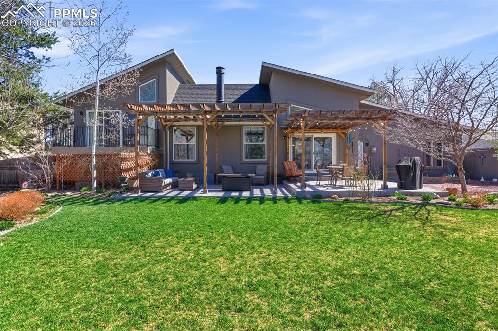 Image 43 of 50: Looking Back Towards Patio With Pergola