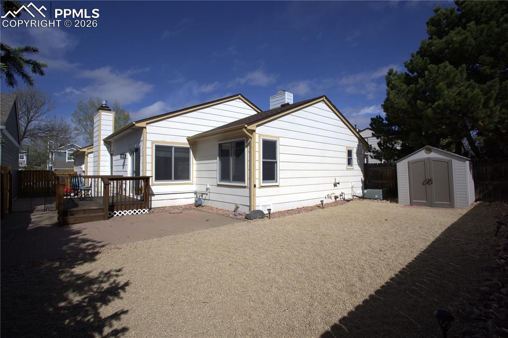Image 26 of 26: Refinished deck / patio area and hard standing for RV storage - Rubbermaid 