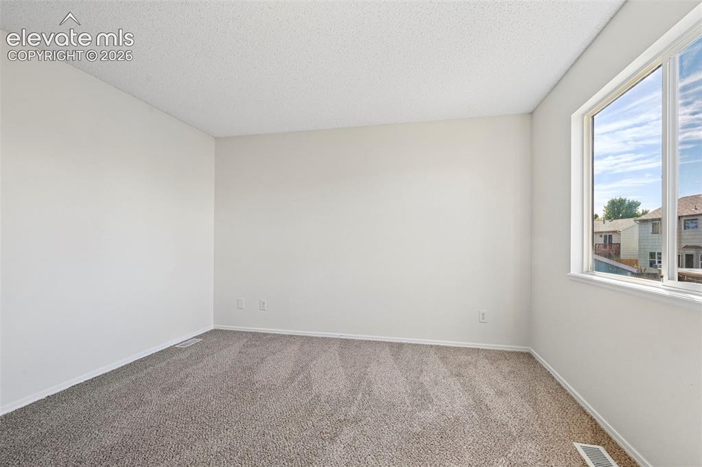 Image 13 of 34: Master Bedroom