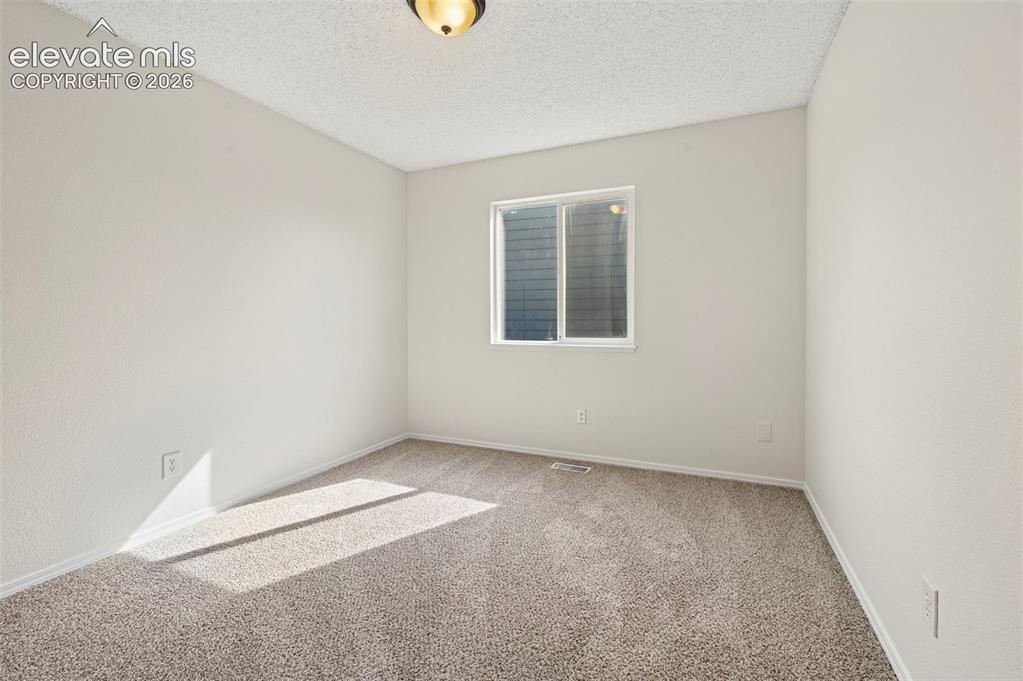 Image 16 of 34: Upper Guest Bedroom 
