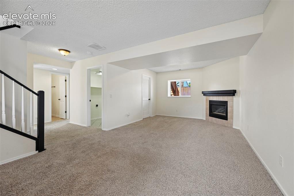Image 18 of 34: Lower Level Living Room