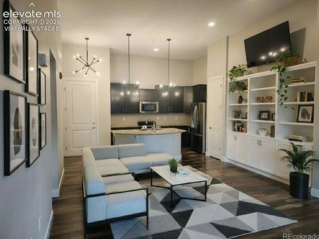 Image 18 of 29: this living room is virtually staged 