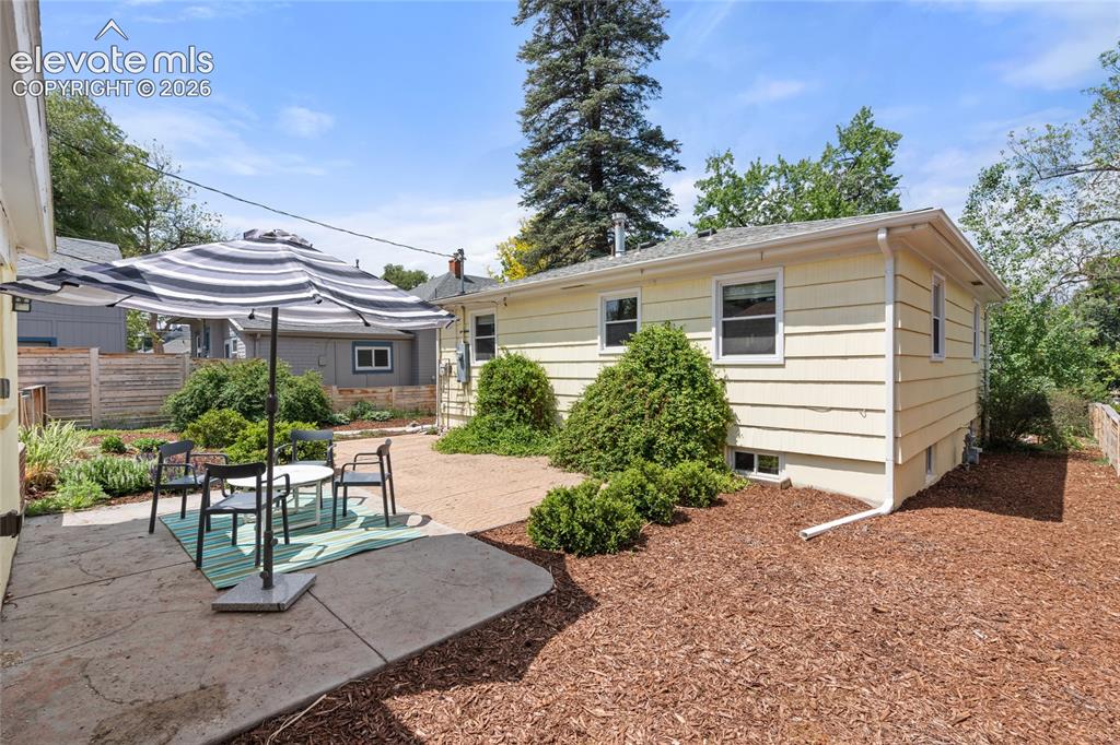 Image 21 of 27: Backyard patio space!
