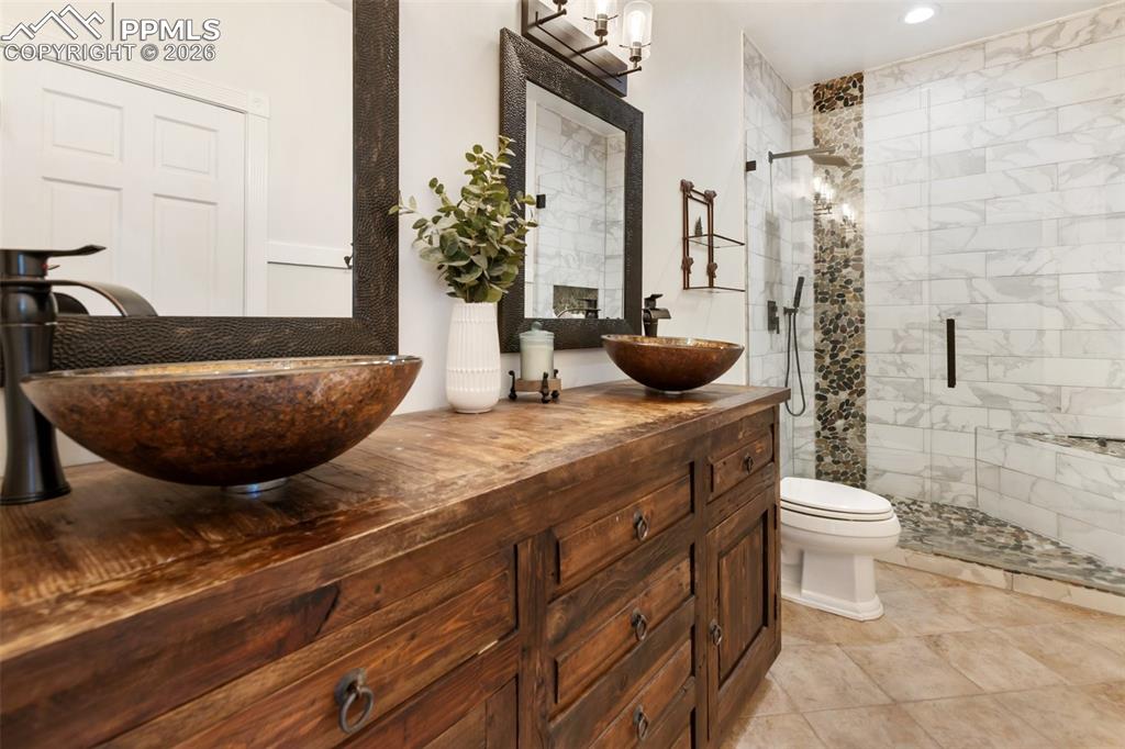 Image 28 of 50: Basement Bathroom