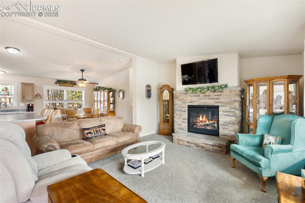 Image 31 of 50: Family room and dining