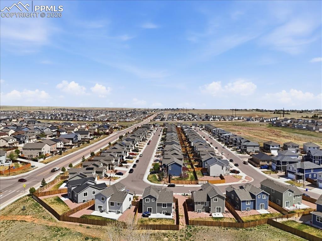 Image 44 of 47: Aerial view showcasing the residential neighbourhood with numerous properti