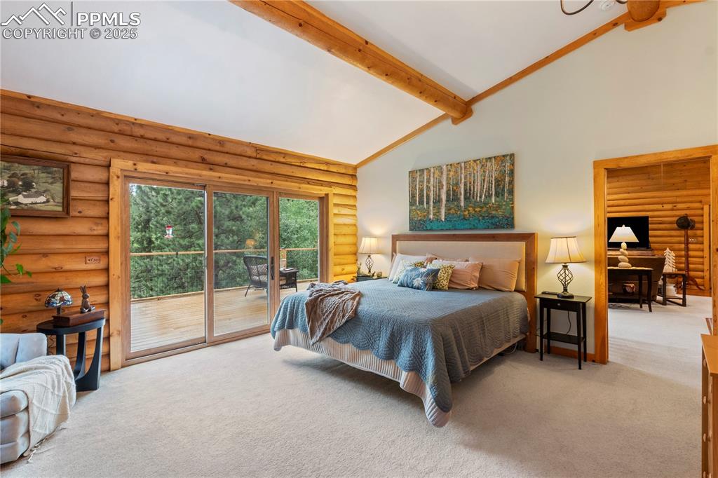 Image 20 of 46: Large bedroom suite w/walkout to deck