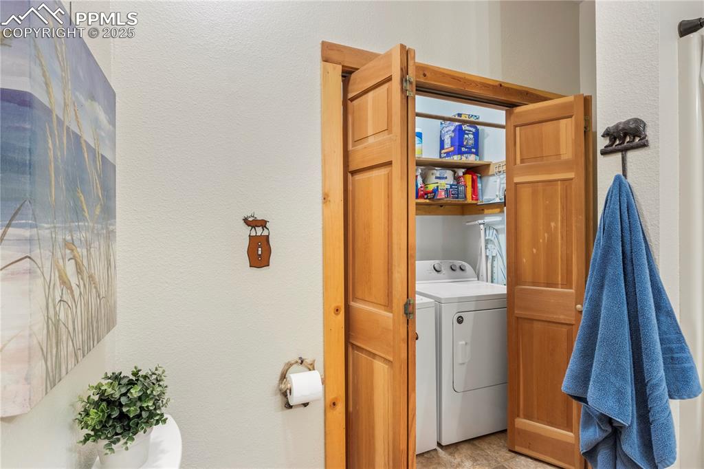 Image 33 of 46: Laundry space in Bath #2 on lower level